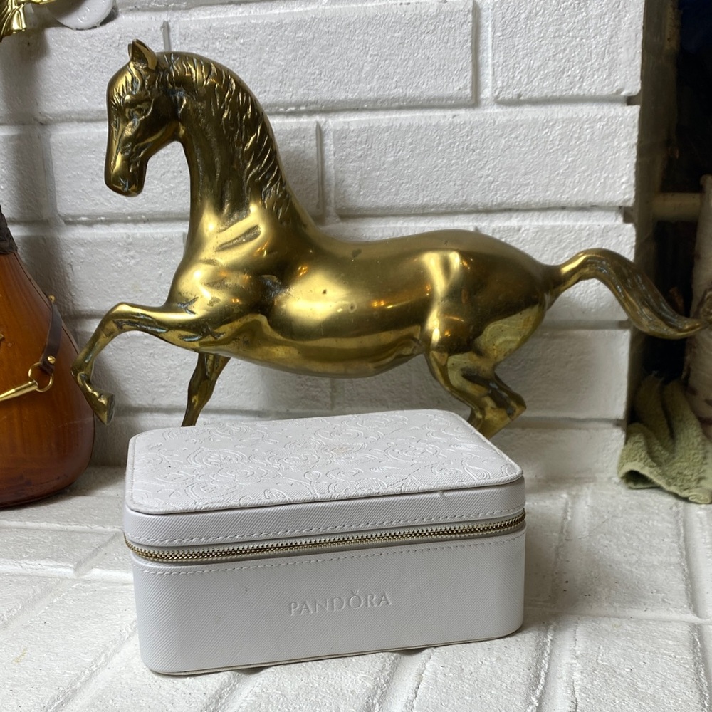 PANDORA white jewelry travel case.